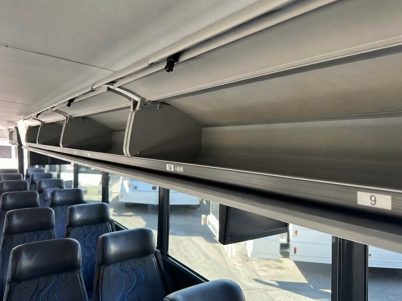 aiken 18 passenger minibus overhead storage