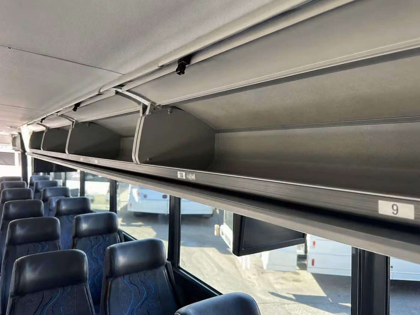aiken 25 passenger minibus overhead storage