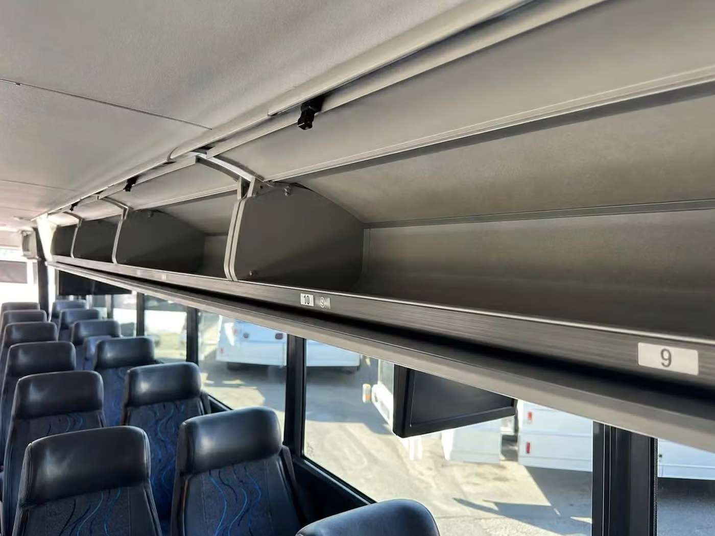 aiken 28 passenger minibus overhead storage