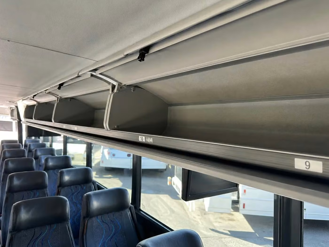 aiken 35 passenger minibus overhead storage