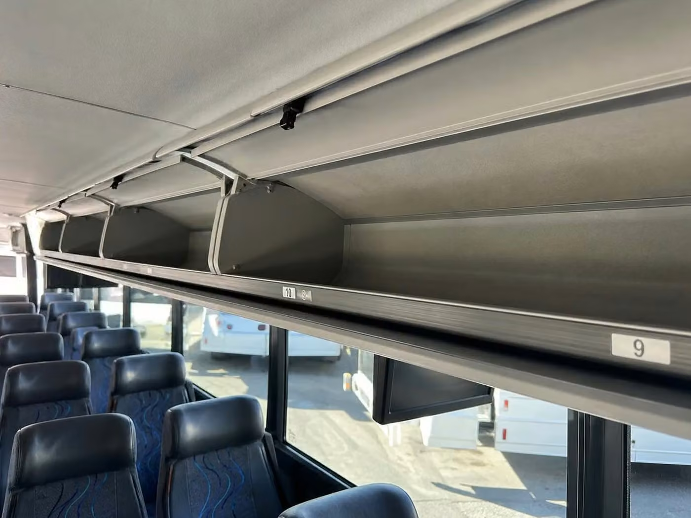 aiken 56 passenger charter bus overhead storage